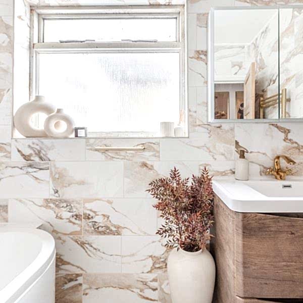 Valeria Gold Marble Effect Tiles in a beautiful modern bathroom