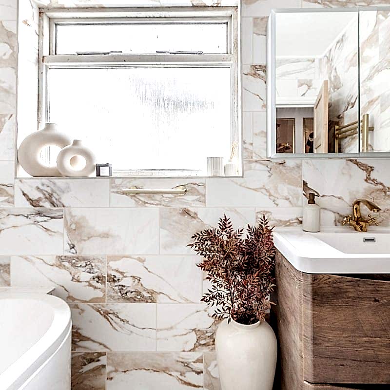 Valeria Gold Marble Effect Tiles in a beautiful modern bathroom