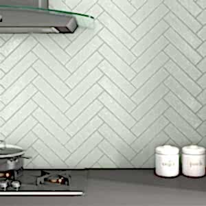 Captiva Sage Green Metro Tiles in a kitchen setting with the tiles in a herringbone layout