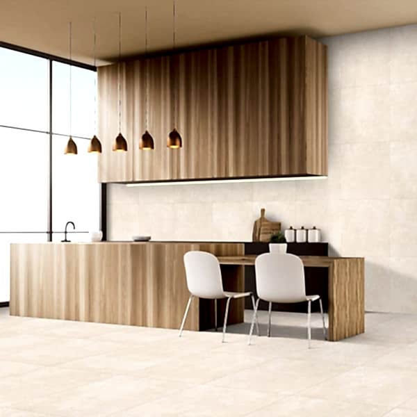 Jude Ivory Matt Tiles. View of a kitchen with beige walls, wooden furniture and white chairs. There is a large window.