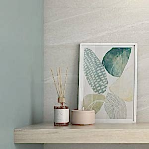 Eddystone White Stone Wall Tiles - shelf detail with a candles and a lovely print of mint leaves