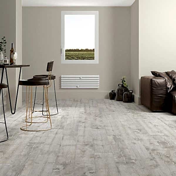 Rustic living room with white wood effect porcelain tiles and cosy furiture set-up along with stylish dining seats.