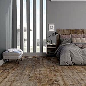 Rustic modern bedroom with beige wood effect tiles and stylish bed set-up with a cozy corner and a well lit-up space