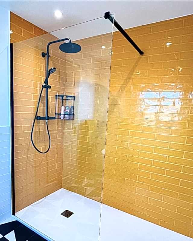 Yellow bathroom with handicraft mustard metro yellow tiles